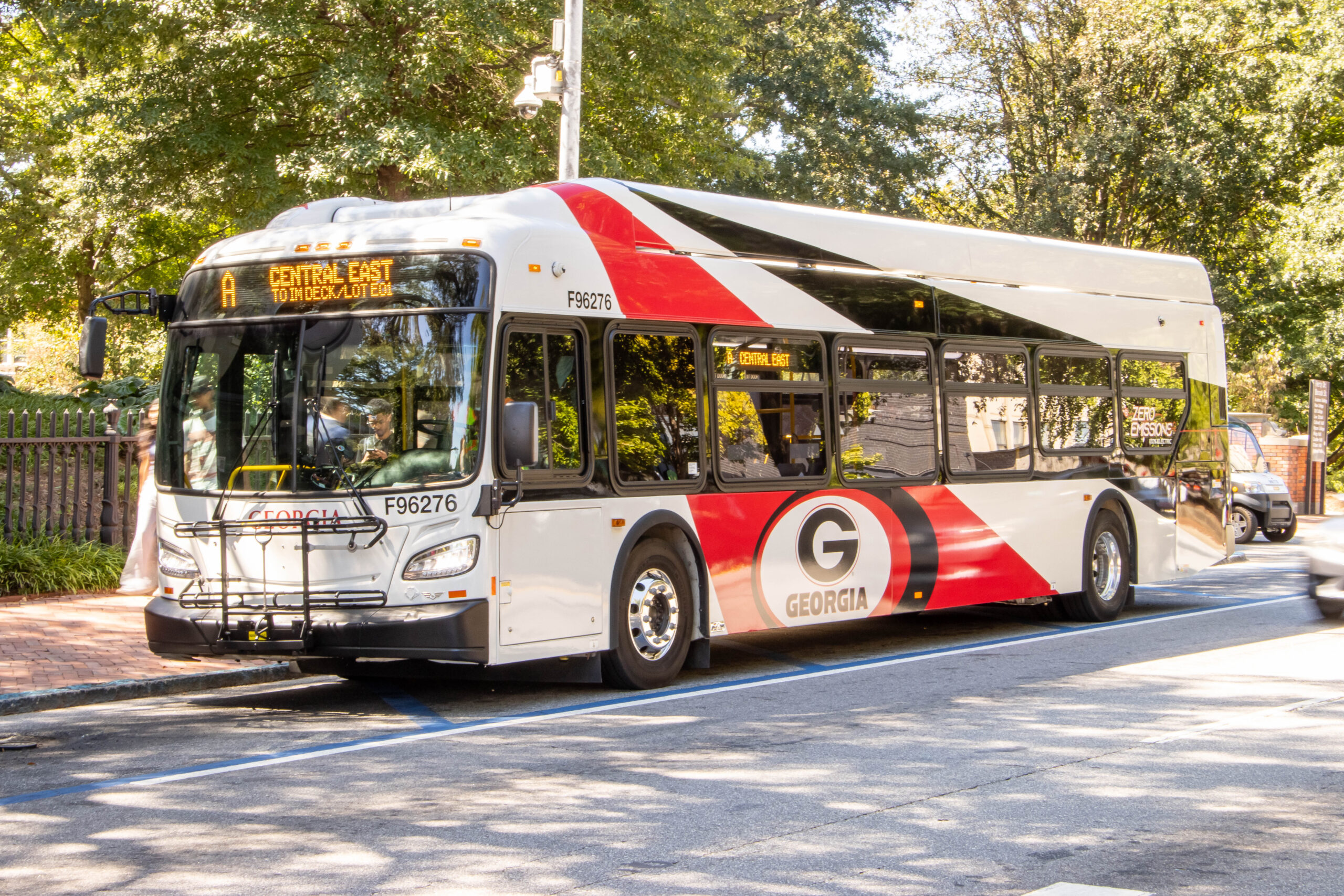 Electric bus at the University of Georgia with new route signage, fall 2025