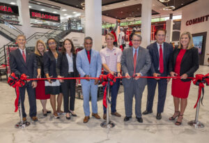 University of Georgia leaders and Follett Higher Education cutting a ribbon at the remodeled UGA Bookstore.